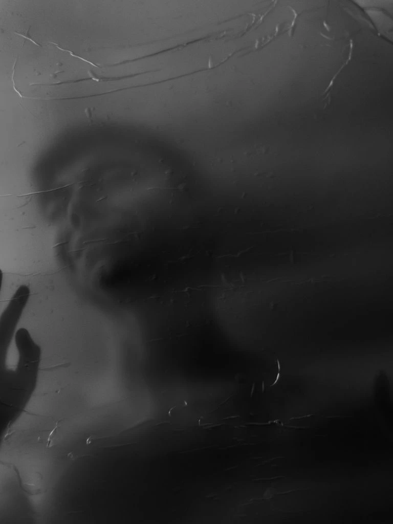 Anonymized portrait silhouette accompanying a first-person workplace story excerpt